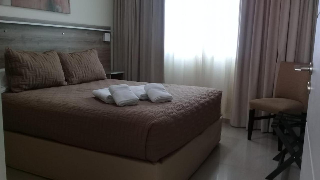 Illia 121 Apart Hotel Neuquén Szoba fotó